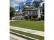 Beautiful two-story home with a well-maintained lawn and attached three-car garage at 2159 Holland Creek Ln, Buford, GA 30519