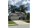 Lovely two-story brick home featuring a spacious driveway and well-manicured front yard at 2159 Holland Creek Ln, Buford, GA 30519