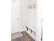 Mud room features built-in bench and cubbies, with hooks for hanging items at 2159 Holland Creek Ln, Buford, GA 30519