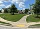 Picturesque neighborhood with sidewalks, green spaces, and a community playground at 2159 Holland Creek Ln, Buford, GA 30519