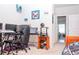 Home office with multiple computer setups and a view to the hallway at 2159 Holland Creek Ln, Buford, GA 30519