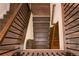 Overhead view of a wood staircase with dark metal banisters at 2159 Holland Creek Ln, Buford, GA 30519