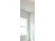 Empty room with carpet floors and large window at 267 Eason St, Bowdon, GA 30108