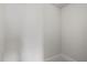 Unfinished walk-in closet with neutral carpet and bright white walls at 3487 Binghurst Rd, Suwanee, GA 30024