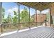 Inviting covered backyard deck is perfect for relaxing outdoors, rain or shine at 3487 Binghurst Rd, Suwanee, GA 30024