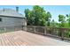 Spacious backyard deck offers views of the yard and surrounding greenery at 3487 Binghurst Rd, Suwanee, GA 30024