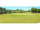 Expansive and beautifully maintained golf course, offering a scenic and challenging experience for golf enthusiasts at 3487 Binghurst Rd, Suwanee, GA 30024
