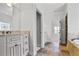 Bright primary bathroom with granite countertops, white cabinetry, and tiled floors at 3487 Binghurst Rd, Suwanee, GA 30024