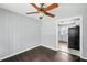 Bright dining room showcasing hardwood floors, ceiling fan, and view to the kitchen through a large opening at 3551 Clay Rd, Austell, GA 30106
