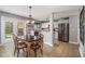 Dining area with modern light fixture and stainless steel appliances at 161 Brasch Park Dr, Grantville, GA 30220
