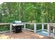Deck with space to grill and enjoy the outdoor scenery at 2125 Clay Rd, Austell, GA 30106