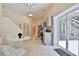Bright kitchen and dining area with sliding doors and easy access to a staircase at 2125 Clay Rd, Austell, GA 30106