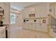 Spacious kitchen with lots of cabinet space, a countertop and a wine rack at 2125 Clay Rd, Austell, GA 30106