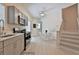 Well-lit kitchen and dining area with stairs to the second floor at 2125 Clay Rd, Austell, GA 30106