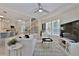 Bright living room and kitchen area with lots of natural light and hardwood floors at 2125 Clay Rd, Austell, GA 30106