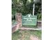 Sweet Water Park sign with decorative stone columns, surrounded by lush greenery at 2125 Clay Rd, Austell, GA 30106