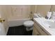Bathroom showcasing a bathtub with shower, toilet, and a sink with vanity at 330 Christian Woods Dr, Conyers, GA 30013