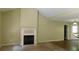 Spacious living room featuring a fireplace, vaulted ceilings, and an open concept layout at 330 Christian Woods Dr, Conyers, GA 30013