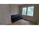 A bedroom with a couch next to a window at 2980 Wanda Sw Cir, Atlanta, GA 30315