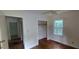 Bright bedroom with hardwood floors, natural light, and a closet at 2980 Wanda Sw Cir, Atlanta, GA 30315