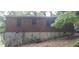 Rear exterior of home with brick exterior and partial view of the air conditioning system at 2980 Wanda Sw Cir, Atlanta, GA 30315