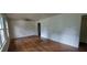 Spacious living room with hardwood floors, natural light, and a ceiling fan at 2980 Wanda Sw Cir, Atlanta, GA 30315