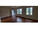 Open living area with hardwood floors, neutral walls, and natural light at 2980 Wanda Sw Cir, Atlanta, GA 30315