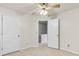 This bedroom features neutral walls, ceiling fan and includes 2 doors for easy access at 405 Mount Vernon Ct, Woodstock, GA 30189