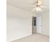 This bedroom features neutral walls, carpet and a door for easy access at 405 Mount Vernon Ct, Woodstock, GA 30189