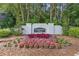 Centennial Place entrance sign surrounded by colorful landscaping at 405 Mount Vernon Ct, Woodstock, GA 30189