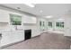 Spacious kitchen with garden window over sink and connecting sunroom at 405 Mount Vernon Ct, Woodstock, GA 30189