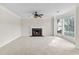 Bright living room with fireplace and a large bay window providing ample natural light at 405 Mount Vernon Ct, Woodstock, GA 30189