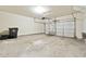 Spacious two car garage with room for storage and access to the home at 6043 China Rose Lane, Johns Creek, GA 30097