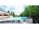 Community pool and lounge area perfect for relaxing and soaking up the sun at 6043 China Rose Lane, Johns Creek, GA 30097