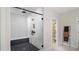 Modern bathroom featuring glass shower with geometric tile and black hardware at 1063 Winding Branch Dr, Canton, GA 30114