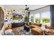 Cozy living room with a modern accent wall, unique wallpaper, and a comfortable sectional sofa at 1063 Winding Branch Dr, Canton, GA 30114