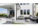 Covered patio with outdoor seating, a fire pit, and a view of the backyard at 1063 Winding Branch Dr, Canton, GA 30114