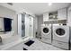 Bathroom with a walk-in shower, washer, and dryer at 113 Stargaze Rdg, Canton, GA 30114
