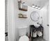 Charming bathroom featuring a patterned floor, unique vanity, and stylish decor at 113 Stargaze Rdg, Canton, GA 30114