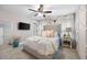 Bedroom featuring soft, neutral tones, a tufted headboard, and decorative wall accents at 113 Stargaze Rdg, Canton, GA 30114