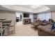 The living room has hardwood floors, a sofa, and television at 113 Stargaze Rdg, Canton, GA 30114