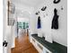 Functional mud room with a built-in bench, coat hooks, and storage baskets at 113 Stargaze Rdg, Canton, GA 30114