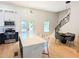 Modern, open kitchen with a large island, stainless steel appliances, and seamless access to a dining area at 123 Dahlgren St, Atlanta, GA 30317