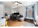 Bedroom space with hardwood floors, natural light, and versatile setup for office or guest room at 2063 Willow Chase Ct, Tucker, GA 30084