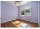 Cozy bedroom with hardwood floors, natural light, and neutral paint at 2063 Willow Chase Ct, Tucker, GA 30084