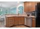 Kitchen sink with hardwood floors, stainless steel appliances, and an open layout at 2063 Willow Chase Ct, Tucker, GA 30084