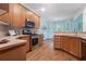 Well-lit kitchen with hardwood floors, modern appliances, and a functional layout for easy meal preparation at 2063 Willow Chase Ct, Tucker, GA 30084