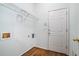 Practical laundry room with shelving, utility hook-ups, and a convenient exterior door at 2063 Willow Chase Ct, Tucker, GA 30084