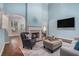 Light filled living room features a fireplace, hardwood floors, and an open floor plan for comfortable living at 2063 Willow Chase Ct, Tucker, GA 30084