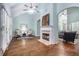 Bright room with vaulted ceiling, fireplace and hardwood floors, filled with natural light and an open layout at 2063 Willow Chase Ct, Tucker, GA 30084